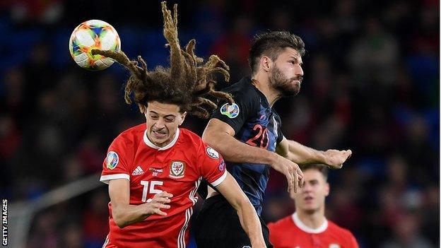 Croatia's Domagoj Vida heads the ball during the Euro 2020 soccer