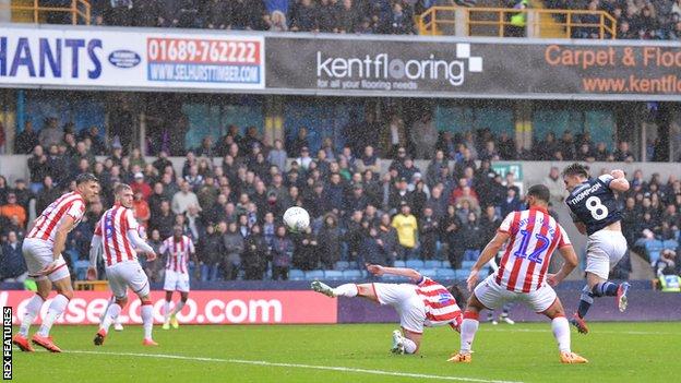 Millwall's Ben Thompson side foots in from 10 yards against Stoke to score his first goal of the season.