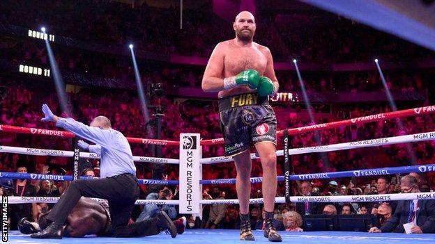 Tyson Fury walks away after stopping Deontay Wilder