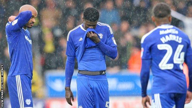 Cardiff City players are dejected following defeat at Burton