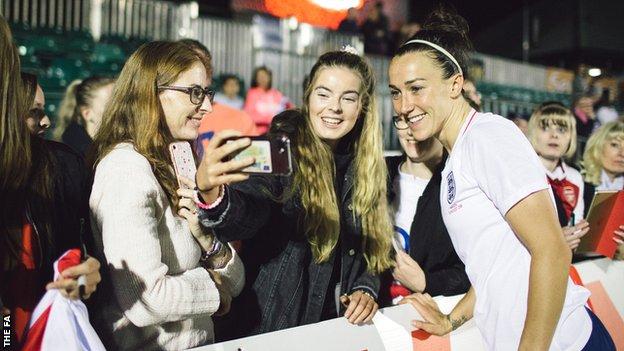 England fans take a selfie with Lucy Bronze