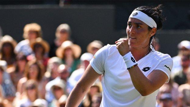 Ons Jabeur celebrates during her Wimbledon semi-final win