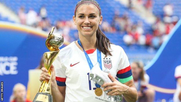 Alex Morgan celebrates with the Women's World Cup