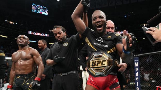 Leon Edwards celebrates beating Kamaru Usman at UFC 278