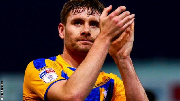 Mansfield Town defender Joe Riley celebrates after his side's League Two win over Bradford City on 25 January 2020