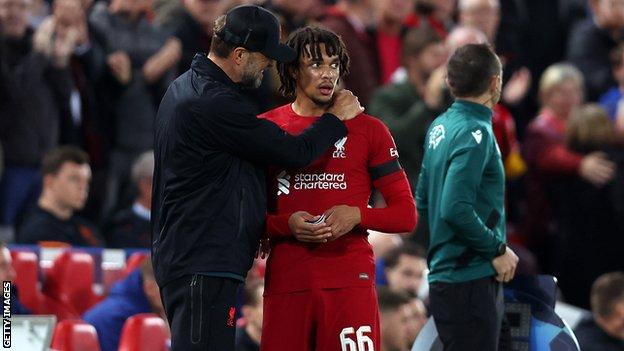 Jurgen Klopp hugging Trent Alexander-Arnold after being substituted