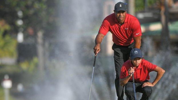 Tiger Woods with his son Charlie