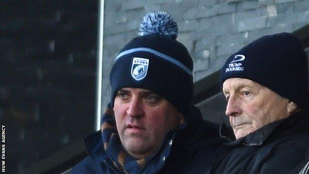 Richard Holland and Blues chairman Peter Thomas watch the team in action