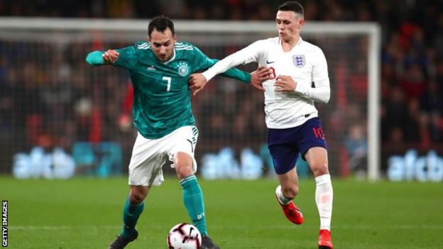 Phil Foden battling for the ball