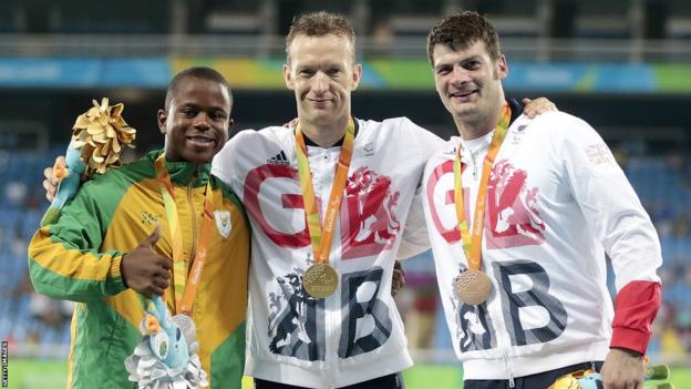Ntando Mahlangu, Richard Whitehead and Dave Henson on the podium in Rio