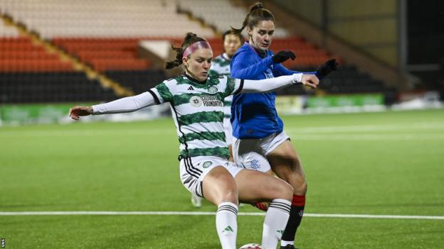 Celtic player Caitlin Hayes and Rangers player Rio Hardy