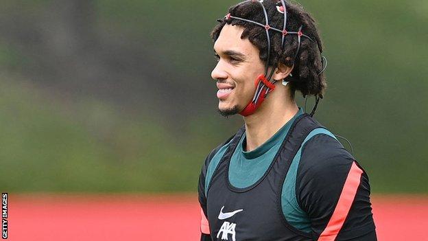 Trent Alexander-Arnold trains wearing analytical head gear