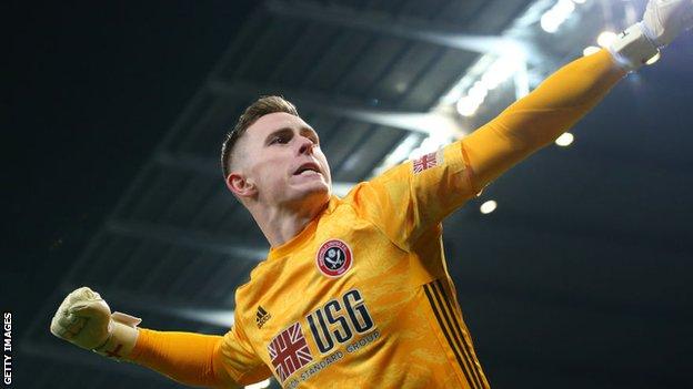 Dean Henderson celebra mientras juega en el Sheffield United