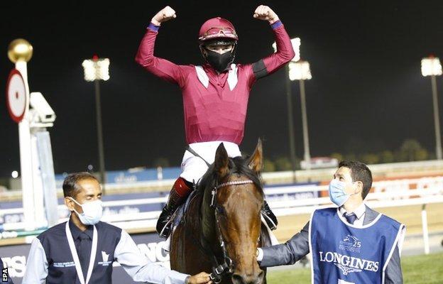 David Egan celebrates on Dubai winner Mishriff