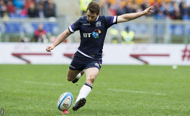 Scotland's Greig Laidlaw scores against Italy in Rome