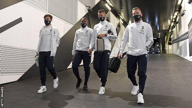 Juventus players arrive at the Allianz Stadium
