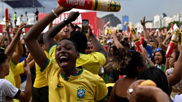 Brazil supporters celebrating at a fan festival on Copacabana beach, Rio de Janeiro