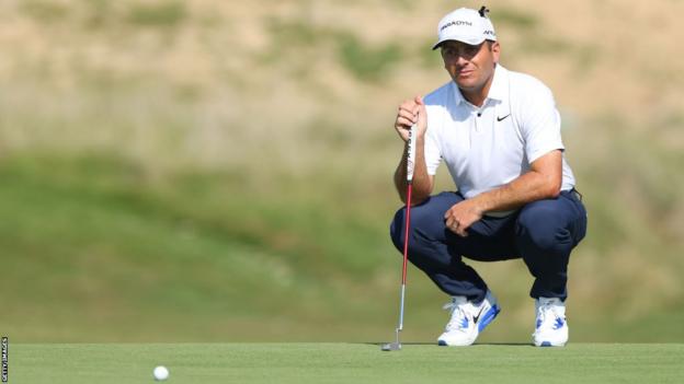 Francesco Molinari lines up a putt