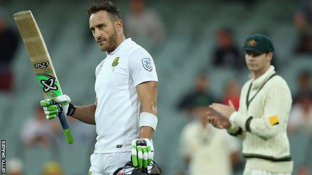 Faf du Plessis celebrating a century against Australia while Steve Smith watches on