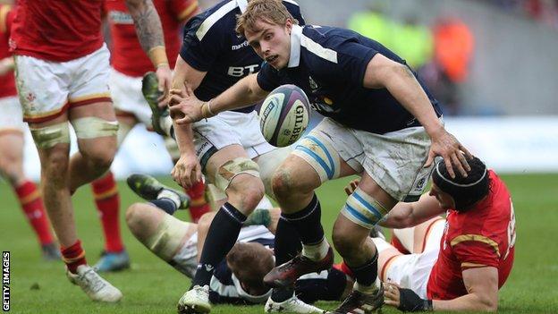 Scotland lock Jonny Gray contests the ball against Wales