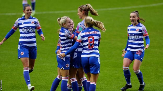 Reading players celebrate Amy Turner's own goal in the WSL