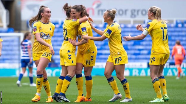Nicoline Sorensen of Everton celebrates scoring her teams third goal with team mates during the FA Women's Super League match at Reading