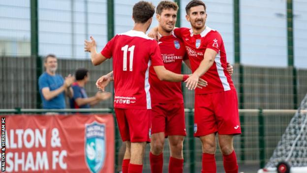 Walton & Herham players celebrate a goal