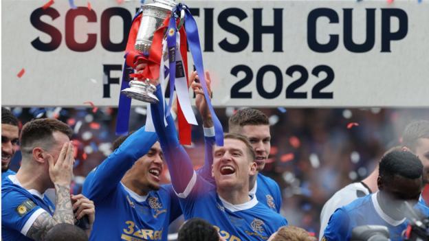 Steven Davis holds the Scottish Cup aloft after Rangers defeated Hearts in the final two years ago