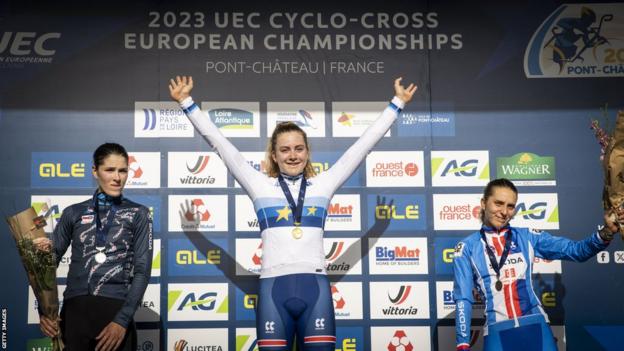 Luxembourg's Marie Schreiber, Britain's Zoe Backstedt and Kristyna Zemanova of the Czech Republic on the podium of the U23 women's race at the Cyclo-cross European Championships