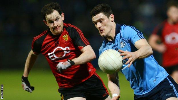 Down's Conall McGovern and Diarmuid Connolly of Dublin in action at Pairc Esler