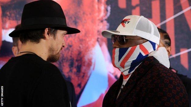 Usyk and Chisora stare down