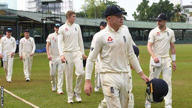 England players walk off after the tour is abandoned during a warm-up game