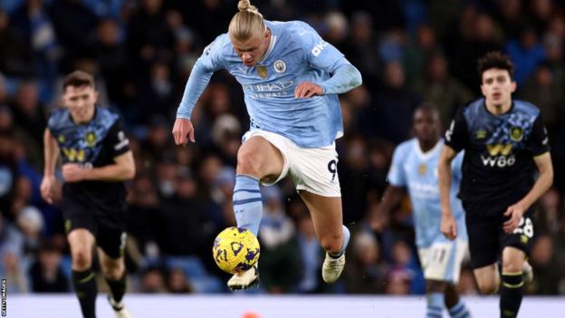 Erling Haaland in action for Manchester City