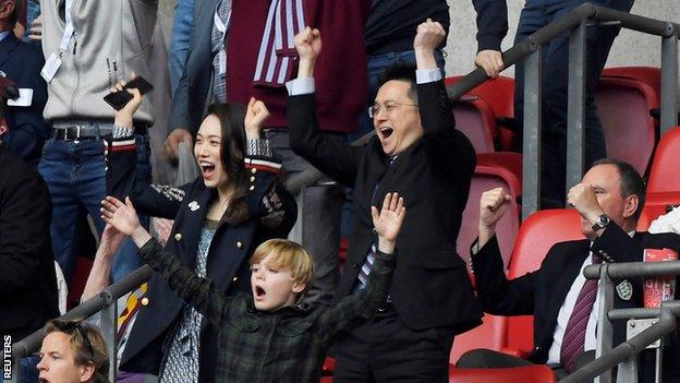 Tony Xia celebrates Villa's promotion to the Premier League