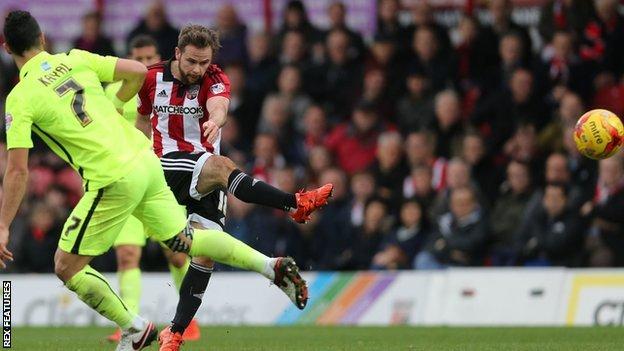 Brentford's Alan Judge shoots for goal against Brighton
