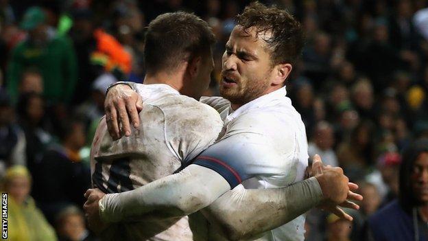 Jonny May is congratulated by Danny Cipriani