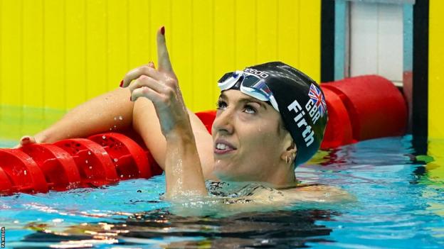 Bethany Firth reacts after her win