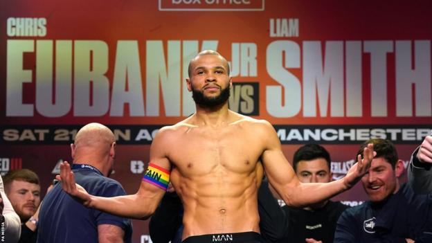 Chris Eubank Jr wears a rainbow armband portion    weighing in