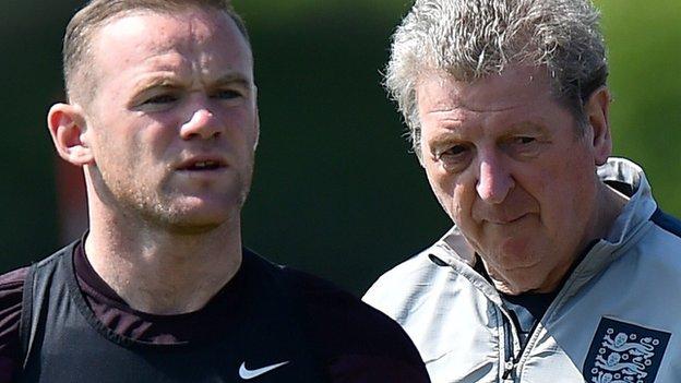 England's Wayne Rooney and Roy Hodgson