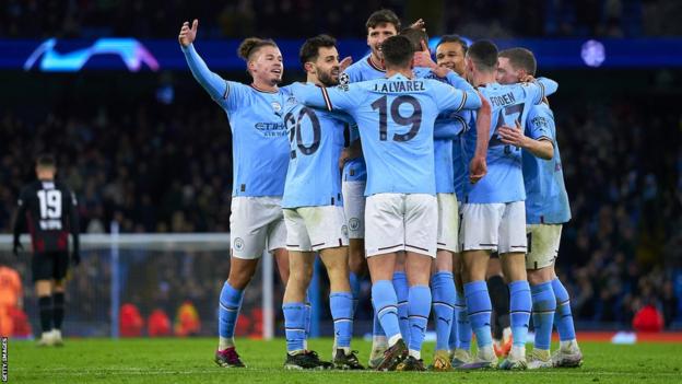 Manchester City's players celebrate a during their side's 7-0 win over RB Leipzig in the Champions League