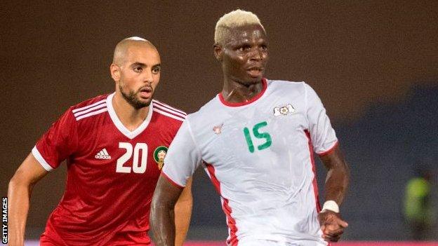 Aristide Bance (right) in action for Burkina Faso against Morocco