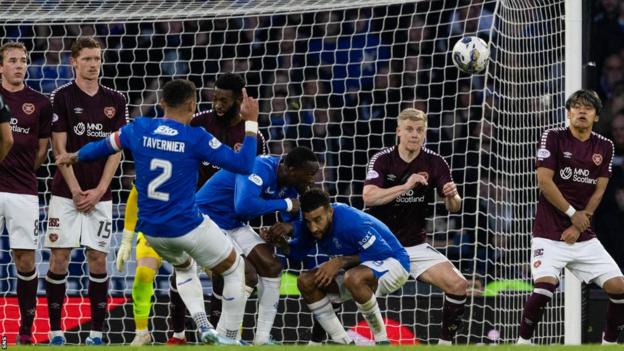 James Tavernier scores a penalty for Rangers against Hearts