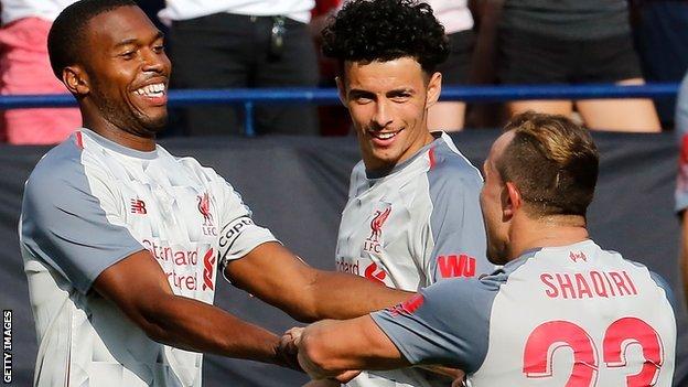 Daniel Sturridge celebrates with Xherdan Shaqiri