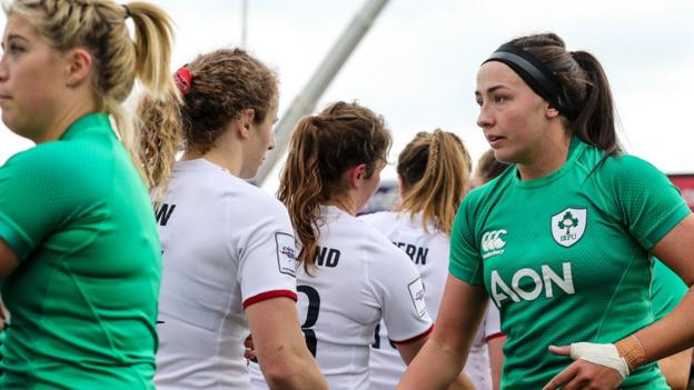 Ireland captain Nichola Fryday shakes hands with the England players in Musgrave Park