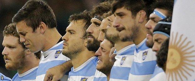 Argentina's players are visibly moved during the anthems before their quarter-final win against Ireland