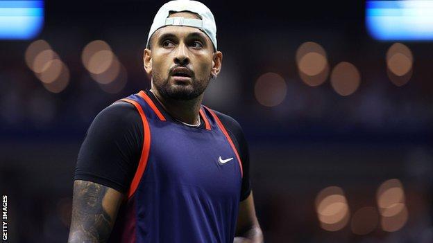 Nick Kyrgios looks up at the court