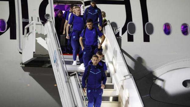England players arrive in Qatar