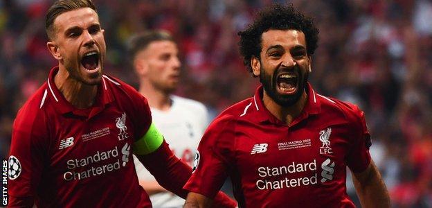 Jordan Henderson and Mohamed Salah celebrate the Egyptian's goal against Tottenham