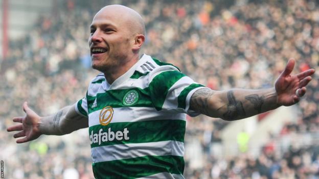 Aaron Mooy celebrates his early goal at Tynecastle