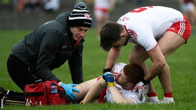 Tiernan McCann attempts to comfort his team-mate Cathal McShane after the All-Star was injured at Tuam